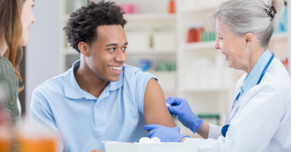 African American man getting flu vaccine