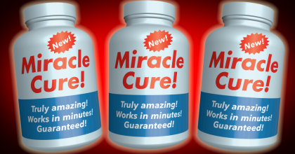 Three pill bottles with the label "Miracle Cure".